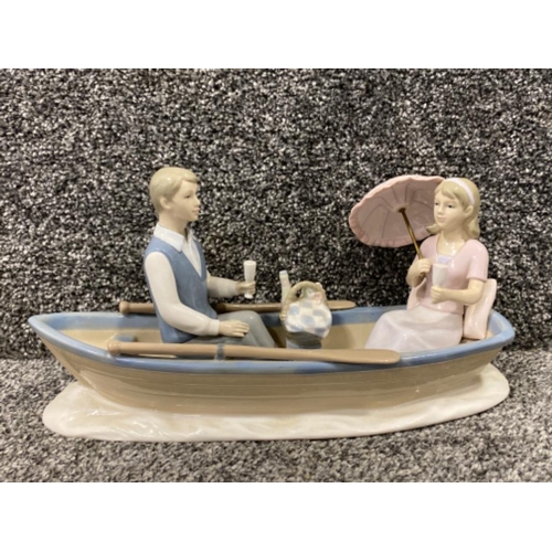 69 - Figure from the Leonardo collection man and lady on boat