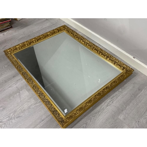 83 - Large gilt framed bevelled edge mirror, 115x90cm