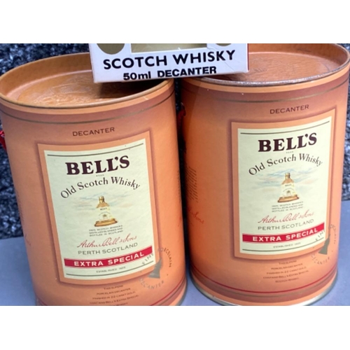 87 - 3 bottles of vintage 5cl Bells old scotch whisky, still sealed In original boxes