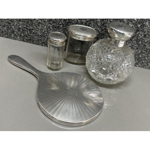 13 - Lot comprising of 4x dressing table items all London silver includes 1922 silver backed hand mirror,... 