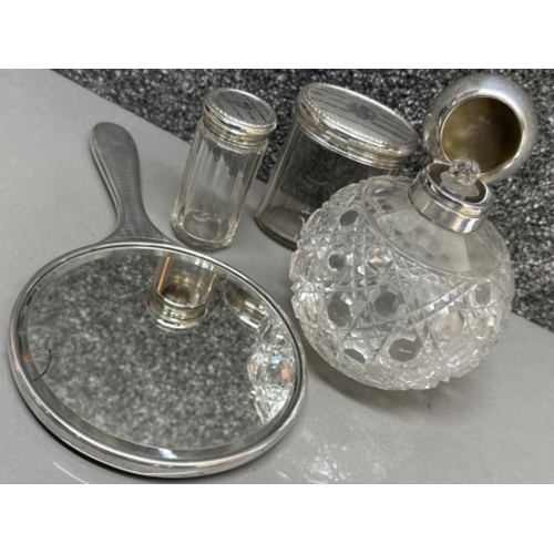 13 - Lot comprising of 4x dressing table items all London silver includes 1922 silver backed hand mirror,... 