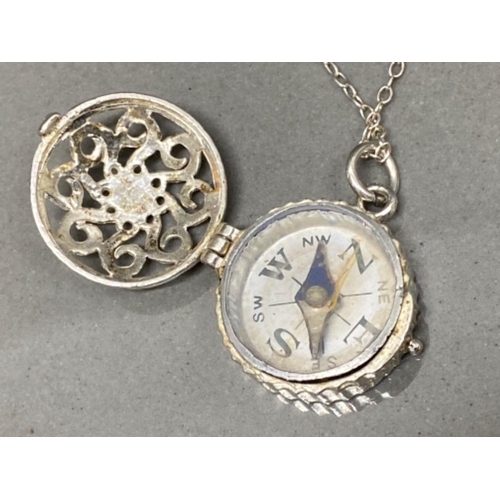 138 - Silver compass pendant & silver chain - 8g gross