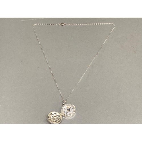 138 - Silver compass pendant & silver chain - 8g gross