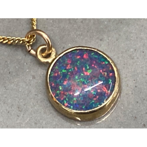 139 - 9ct gold & Opal pendant on silver gold plated chain