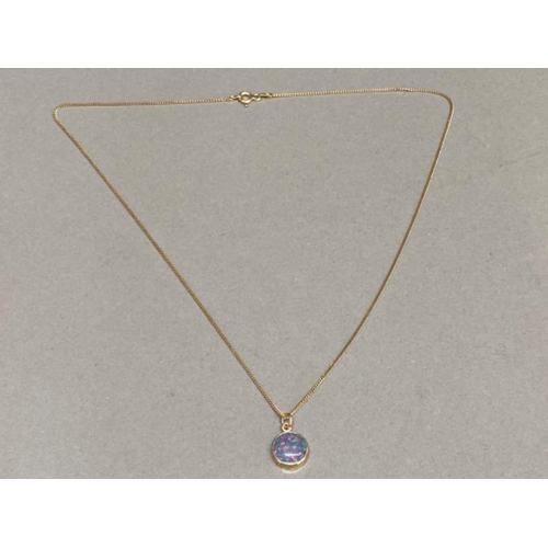 139 - 9ct gold & Opal pendant on silver gold plated chain