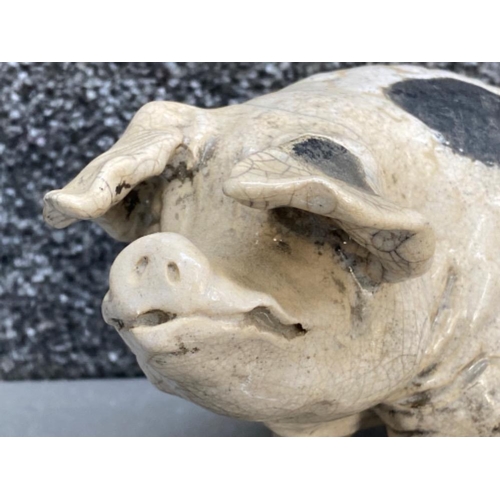 17 - Beautifully sculptured ceramic sitting old spot pig signed to the base 22cms x 10cms