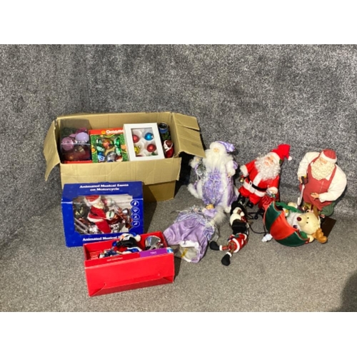 189 - Large lot of various Christmas items to include Santa figures etc