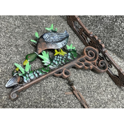 198 - Cast metal wall hanging bell with duck themed decoration