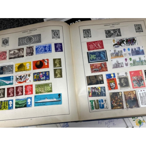 204 - Strand stamp album containing miscellaneous stamps from around the world, also includes a large quan... 