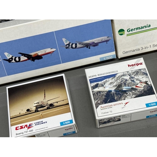 214 - 9x Herpa mini aeroplanes to include Lufthansa and Austrian Arrows