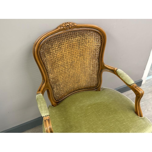 356 - Vintage metal studded & Bergere backed armchair, with green fabric & heavily carved frame