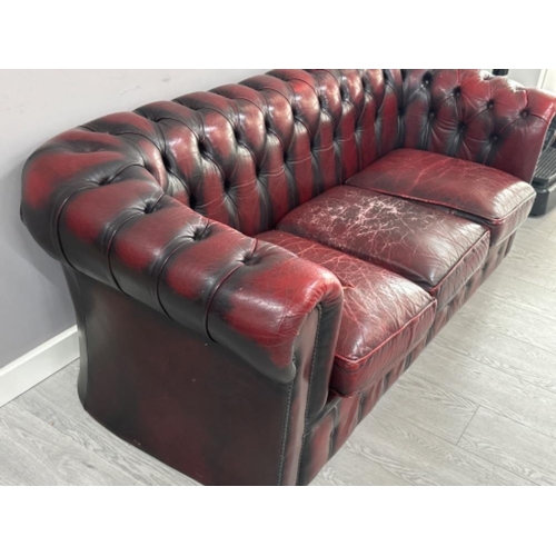 369 - Ox-blood leather metal studded 3 seater chesterfield sofa