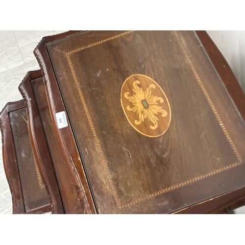 383 - Edwardian Inlaid Mahogany nest of 3 glass topped tables