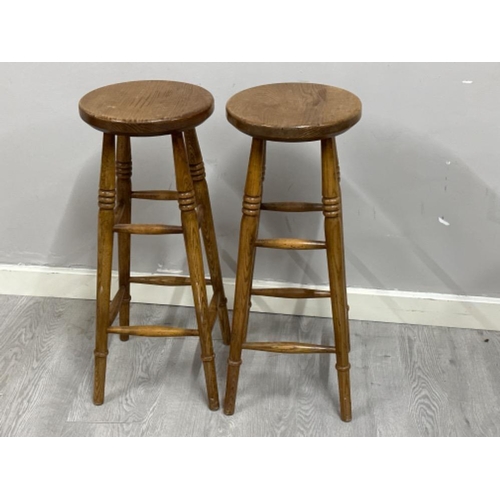 394 - Pair of vintage oak circular seated kitchen high stools