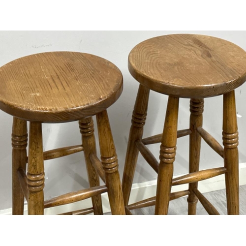 394 - Pair of vintage oak circular seated kitchen high stools