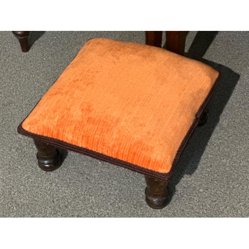 94 - Pair of Victorian chairs, upholstered in an orange fabric with a matching footstool