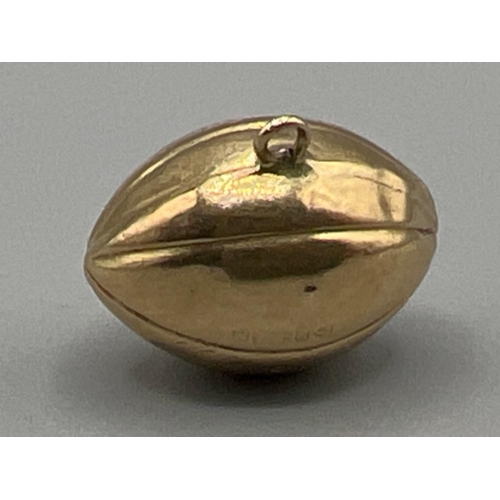 33 - 9ct gold hallmarked Rugby ball charm/pendant (.60g)