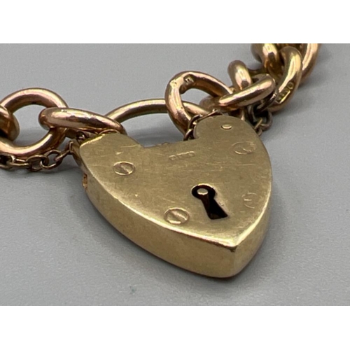 47 - 9ct gold hallmarked Albert bracelet with heart padlock (19.9g)