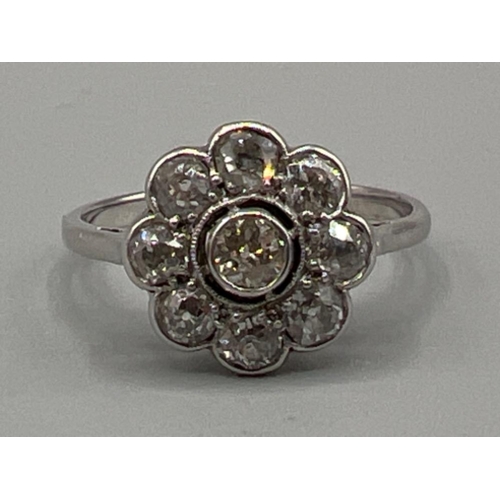 106 - Ladies 18ct white gold diamond flower cluster ring, size N1/2 (2.97g)