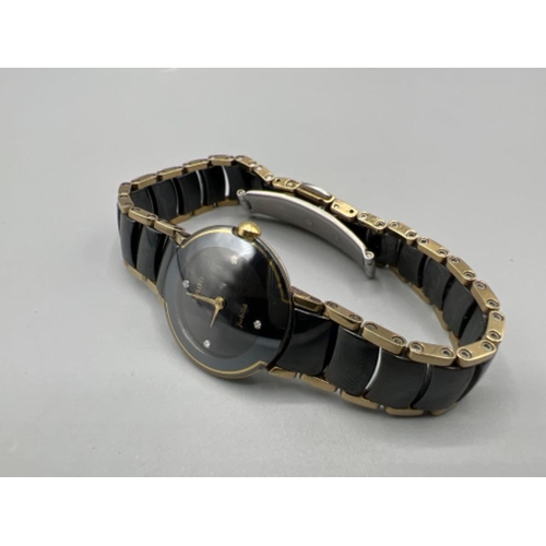 114 - Ladies Rado black and gold ceramic wristwatch