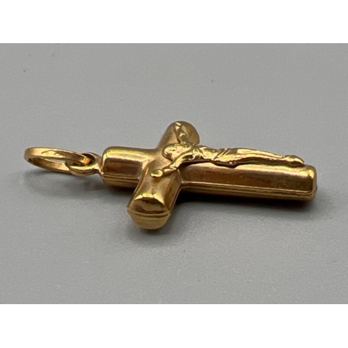 65 - 9ct gold crucifix pendant (1.45g)