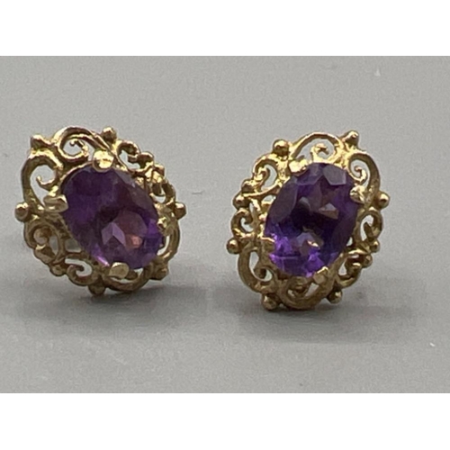 73 - Ladies 9ct gold amethyst stud earrings (1.6g)