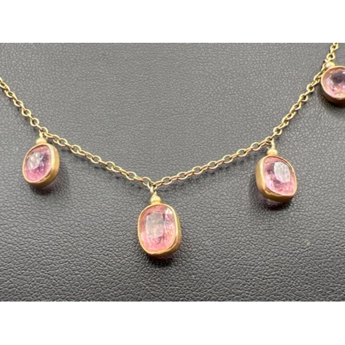 79 - Ladies 9ct gold pink stone pendant necklace (4.84g)