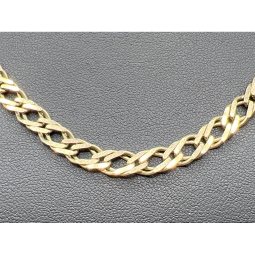 121 - Gents 9ct gold 66cm flat curb double belcher chain (25.74g)