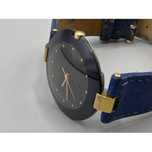 116 - Ladies Rado ceramic face wristwatch with blue leather strap