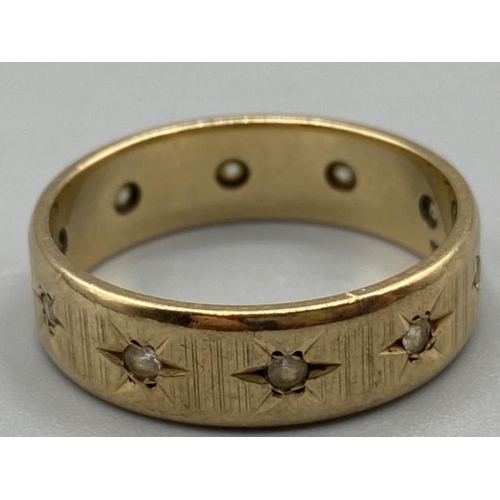 4 - 9ct gold hallmarked band with white stones, size R 4.03g