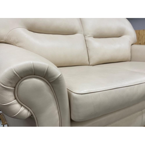 323 - 2 and 1 seater cream leather suite