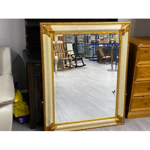 324 - Modern gold framed wall hanging mirror with bevelled edge 125x100cm