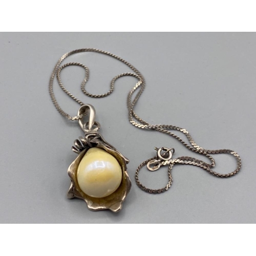 341 - Silver and pearl drop pendant and silver necklet