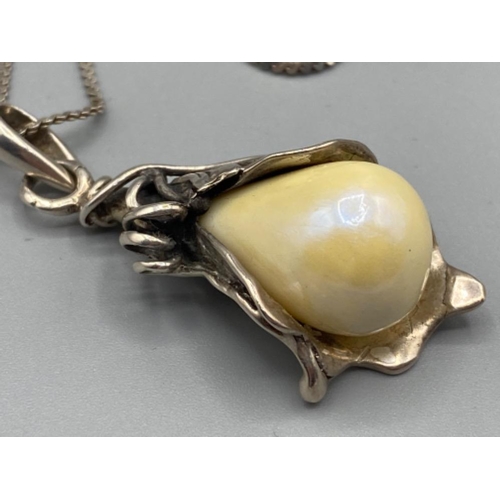 341 - Silver and pearl drop pendant and silver necklet