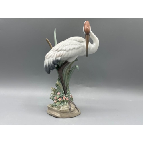 106 - Lladro figure 1612 Preening Crane, good condition, height 19.5cm, with original box