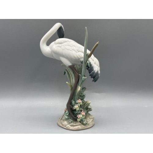 106 - Lladro figure 1612 Preening Crane, good condition, height 19.5cm, with original box