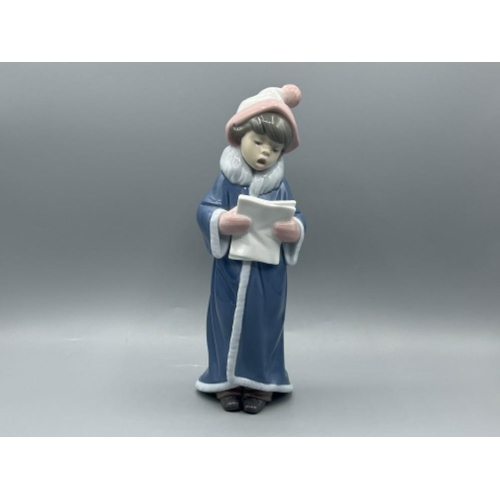 11 - Lladro 6533 ‘The Christmas Caroler’ in good condition and original box