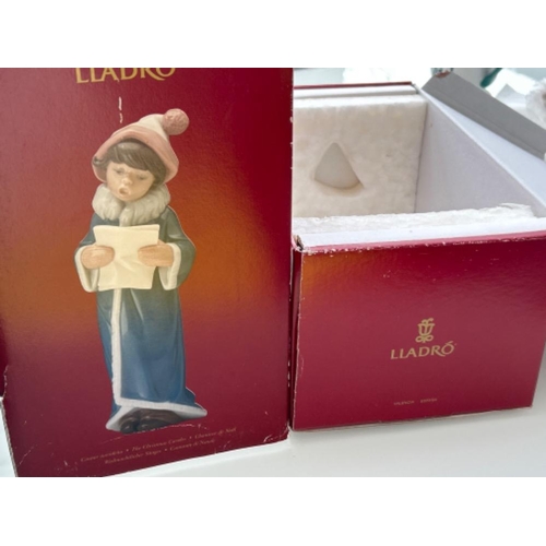 11 - Lladro 6533 ‘The Christmas Caroler’ in good condition and original box