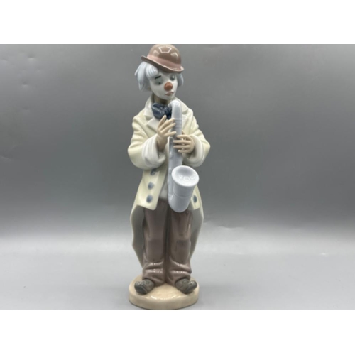 122 - Lladro figure 5471 Sad Sax, good condition, height 23cm