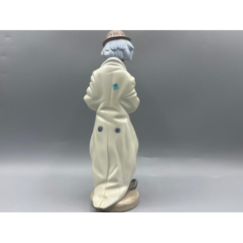 122 - Lladro figure 5471 Sad Sax, good condition, height 23cm