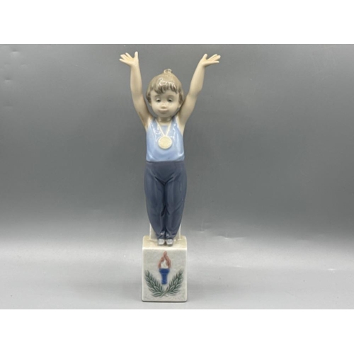 125 - Lladro figure 5871 Olympic Champion, good condition, height 23.5cm