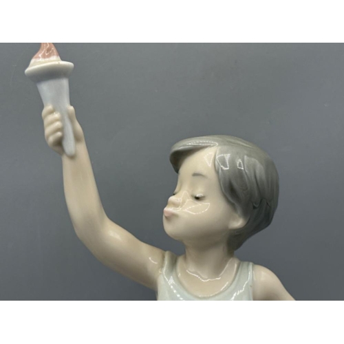 127 - Lladro figure 5870 Olympic Torch, good condition, height 25cm