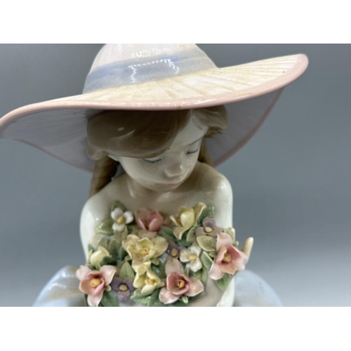 141 - Lladro figure 5862 Fragrant Bouquet, signed on base, good condition, height 20cm