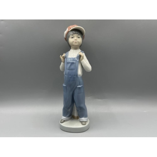 148 - Lladro figure 4898 Boy From Madrid, good condition, height 22cm