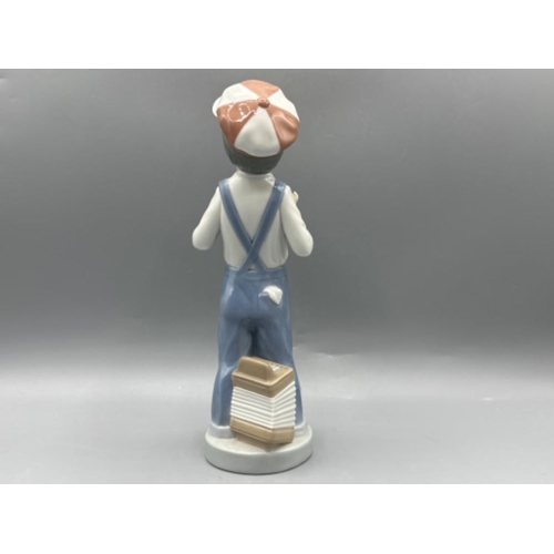 148 - Lladro figure 4898 Boy From Madrid, good condition, height 22cm