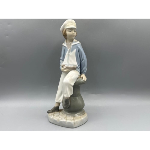 150 - Lladro figure 4810 Boy With Yacht, good condition, height 23.5cm