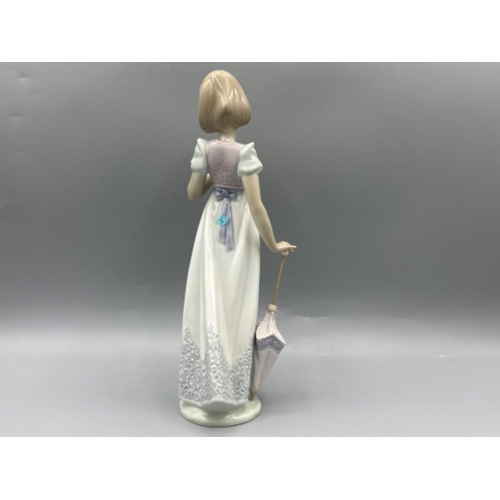 165 - Lladro “1991 Collectors Society” figure 7611 Summer Stroll, signed & dated on base, good condition, ... 