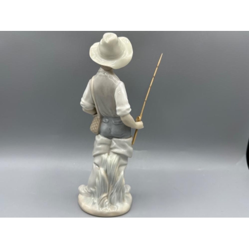 166 - Lladro figure 4809 Fisher Boy, good condition, height 22cm