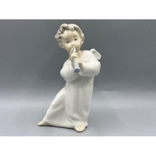 169 - Lladro figure 4540 Angel Playing Flute, good condition, height 16cm