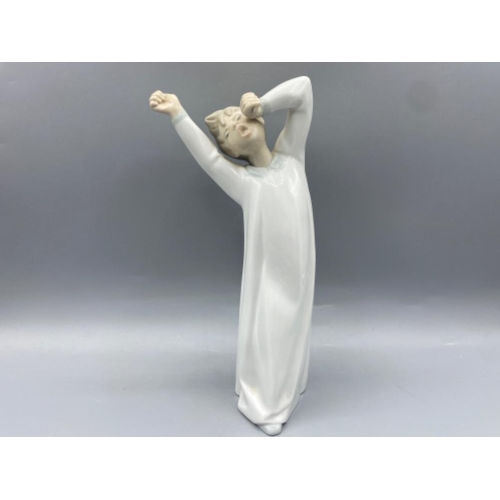 182 - Lladro figure 4870 Boy Yawning in good condition - height 21cm